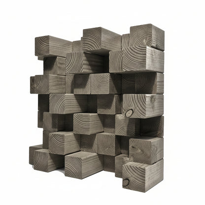 A modern geometric classic grey acoustic diffuser made of stacked rectangular wooden blocks with visible grain patterns, shown against a plain white background. 