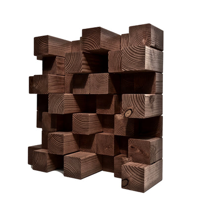A modern geometric classic grey acoustic diffuser made of stacked rectangular wooden blocks with visible grain patterns, shown against a plain white background.